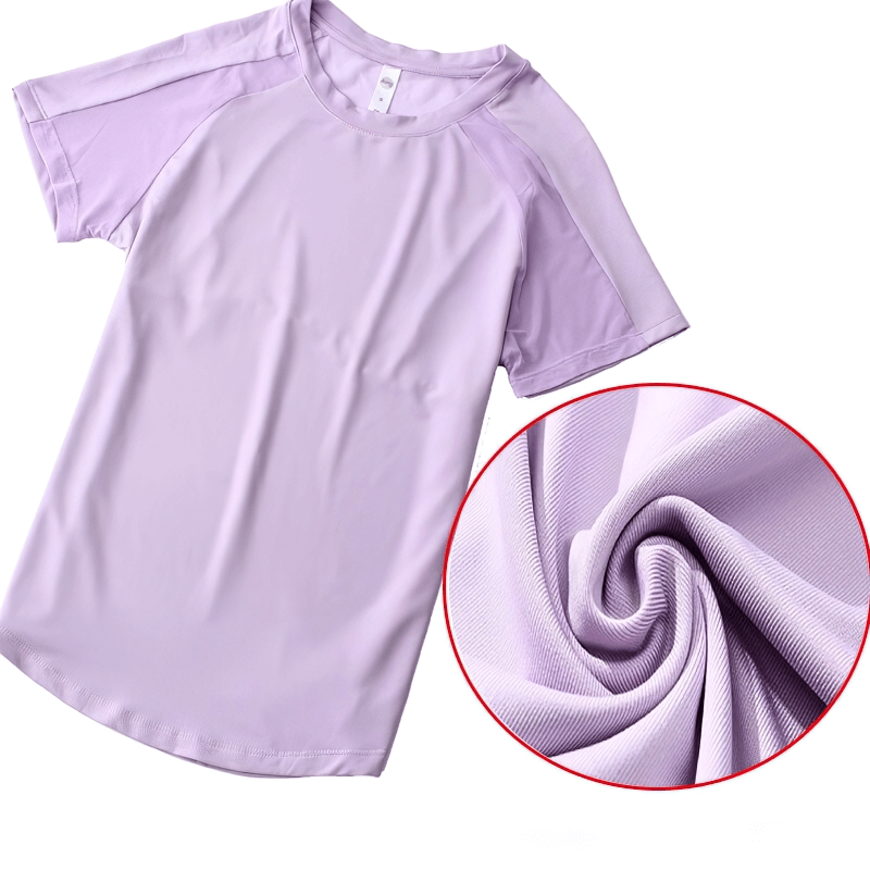 Lilac women's sports t-shirt with mesh back, quick-dry breathable fabric, perfect for training, yoga, and active wear.